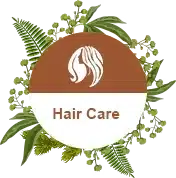Hair care logo with a brown circle, white hair icon, and green leaves on a white background
